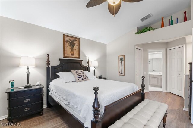 13641 Worthington Way Unit 1612, Bonita Springs, FL 34135 - bedroom featuring vaulted ceiling, wood finished floors, ensuite bath, and a ceiling fan