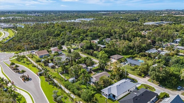 bird's eye view with a view of trees and a residential view