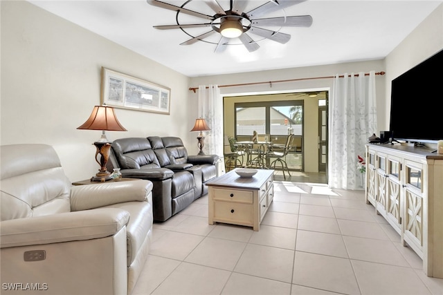 3720 SE 10th Ave Unit 102, Cape Coral, FL 33904 - living area featuring light tile patterned floors and a ceiling fan