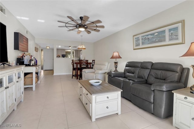 3720 SE 10th Ave Unit 102, Cape Coral, FL 33904 - living area featuring visible vents, a ceiling fan, and light tile patterned floors