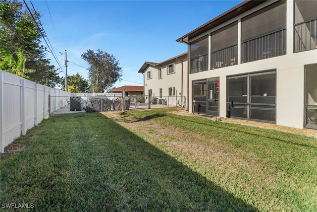 3720 SE 10th Ave Unit 102, Cape Coral, FL 33904 - view of yard with a fenced backyard