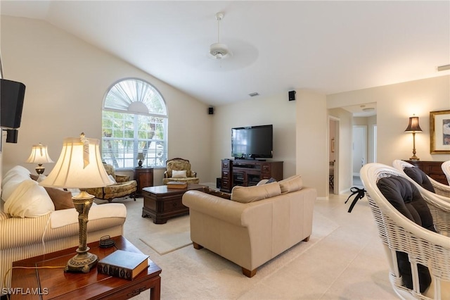 living area with visible vents, a ceiling fan, and vaulted ceiling