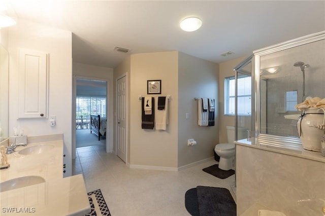 full bath featuring a sink, a shower with shower door, double vanity, toilet, and visible vents
