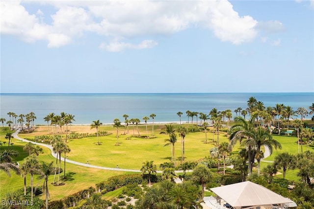 bird's eye view with a water view and golf course view