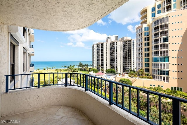 balcony featuring a water view