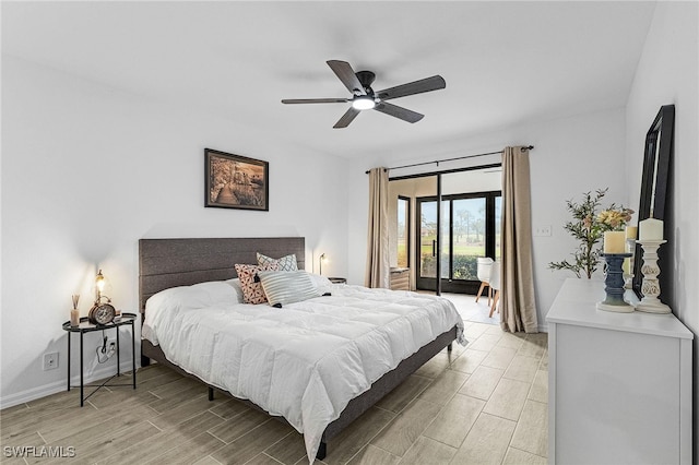 bedroom with baseboards, access to outside, light wood finished floors, and ceiling fan