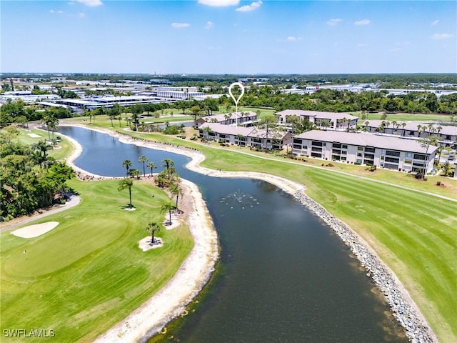 birds eye view of property featuring a water view and view of golf course