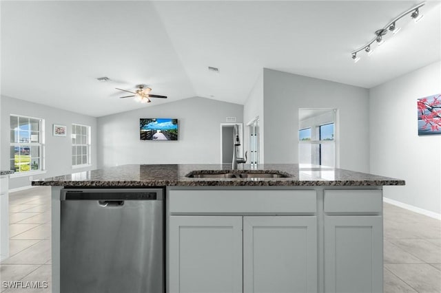 403 NW 17th Ter, Cape Coral, FL 33993 - kitchen with a ceiling fan, dishwasher, a sink, light tile patterned floors, and lofted ceiling