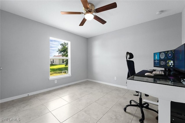 403 NW 17th Ter, Cape Coral, FL 33993 - unfurnished office featuring baseboards, a ceiling fan, and tile patterned floors