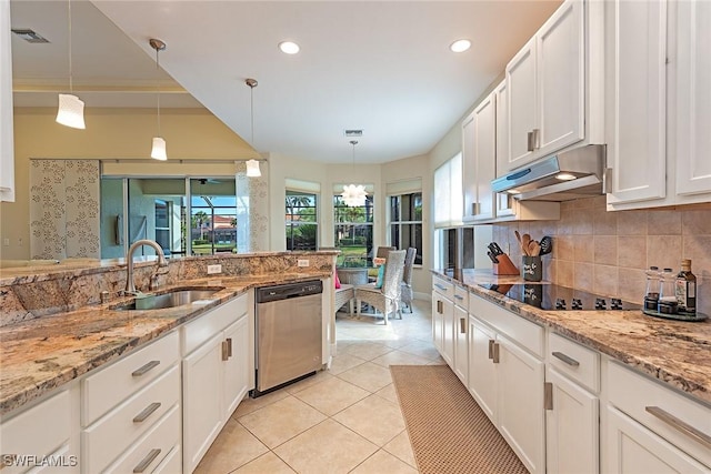 kitchen featuring under cabinet range hood, stainless steel dishwasher, a sink, black electric cooktop, and white cabinets