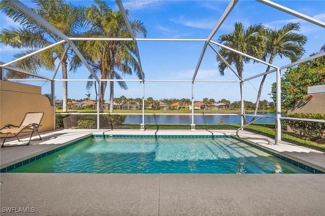 3695 Exuma Way, Naples, FL 34119 - pool with glass enclosure, a water view, and a patio area