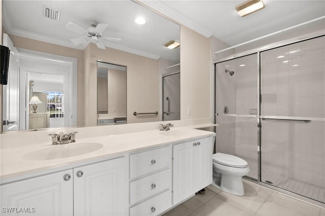 3695 Exuma Way, Naples, FL 34119 - full bathroom with a sink, a tile shower, toilet, and visible vents