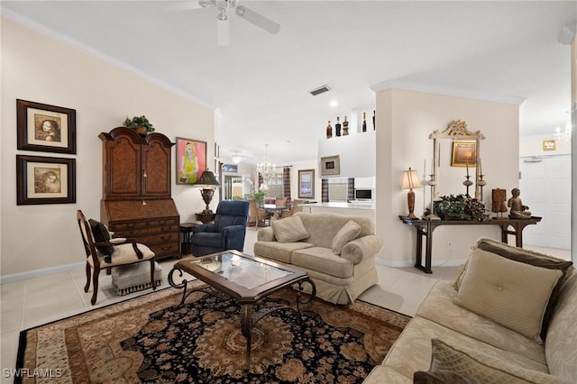 3695 Exuma Way, Naples, FL 34119 - tiled living room featuring baseboards, visible vents, ornamental molding, and ceiling fan with notable chandelier