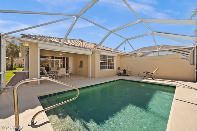 3695 Exuma Way, Naples, FL 34119 - pool featuring glass enclosure, a patio area, and outdoor dining space