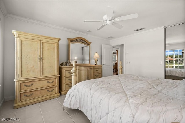 3695 Exuma Way, Naples, FL 34119 - bedroom featuring a ceiling fan, visible vents, ornamental molding, and light tile patterned floors