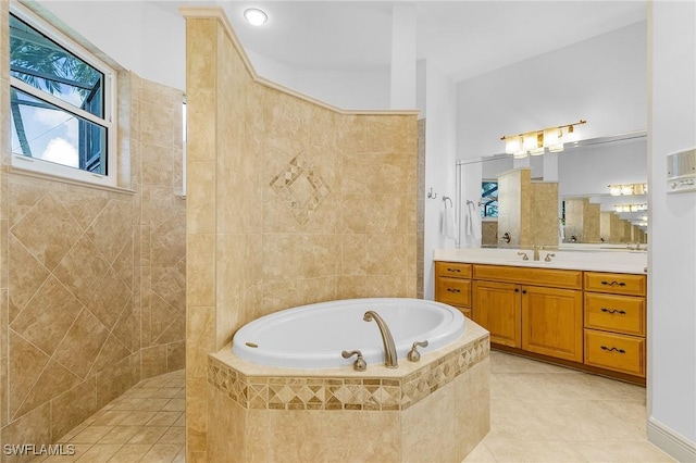 4009 Treadwater Ct, Naples, FL 34109 - bathroom featuring tile patterned floors, walk in shower, and a bath