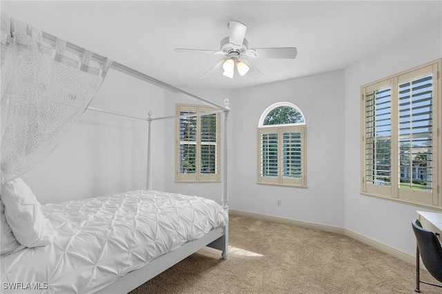 4009 Treadwater Ct, Naples, FL 34109 - carpeted bedroom featuring baseboards and ceiling fan