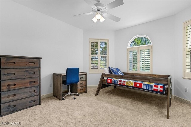 4009 Treadwater Ct, Naples, FL 34109 - carpeted bedroom with baseboards and ceiling fan