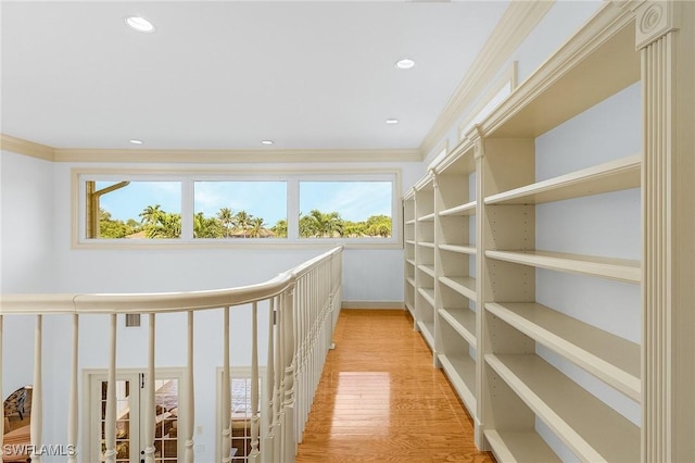 4009 Treadwater Ct, Naples, FL 34109 - corridor with crown molding, recessed lighting, light wood finished floors, and a wealth of natural light