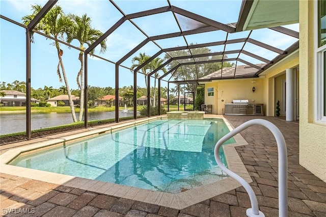 4009 Treadwater Ct, Naples, FL 34109 - view of swimming pool featuring a water view, a pool with connected hot tub, a lanai, and a patio area