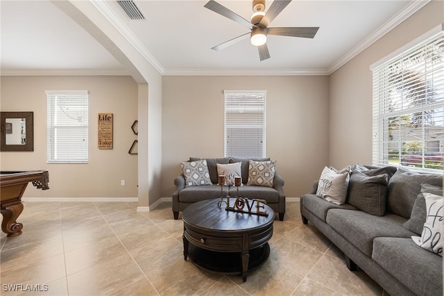 living room featuring light tile patterned floors, ceiling fan, crown molding, and visible vents