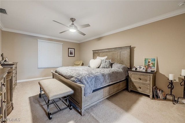 bedroom with ornamental molding, light carpet, baseboards, and visible vents