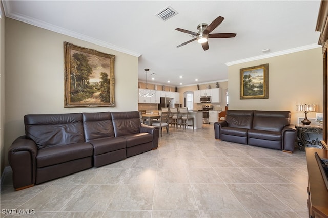 living area with a ceiling fan, recessed lighting, visible vents, crown molding, and arched walkways