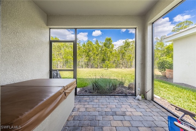 sunroom featuring a wealth of natural light