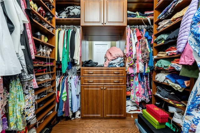 3412 Atlantic Cir, Naples, FL 34119 - spacious closet featuring wood finished floors