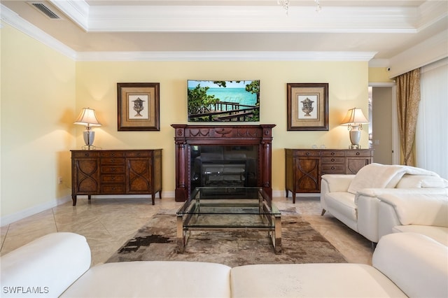 3412 Atlantic Cir, Naples, FL 34119 - living room featuring a raised ceiling, a fireplace, baseboards, visible vents, and ornamental molding