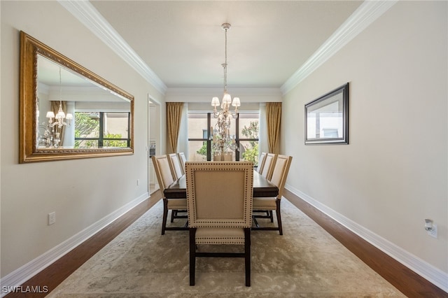3412 Atlantic Cir, Naples, FL 34119 - dining room featuring crown molding, a notable chandelier, and a healthy amount of sunlight