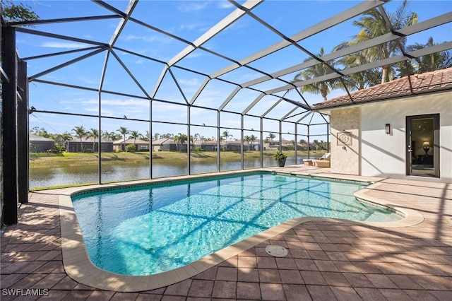 3412 Atlantic Cir, Naples, FL 34119 - outdoor pool with a residential view, a patio, a water view, and glass enclosure