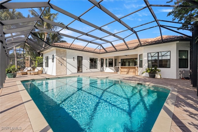 3412 Atlantic Cir, Naples, FL 34119 - back of house with a patio, ceiling fan, stucco siding, and a tile roof