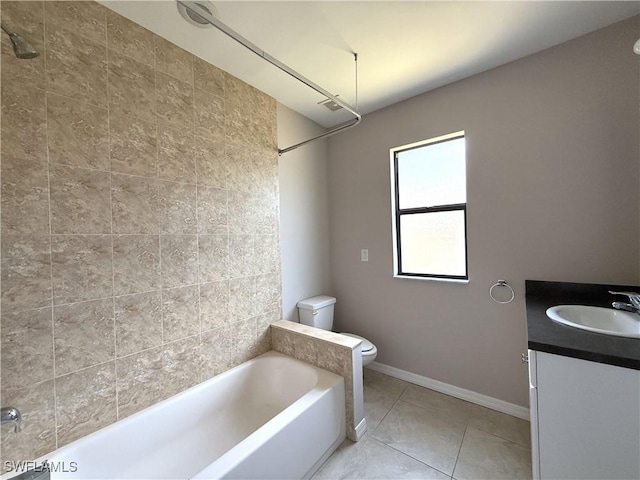 full bathroom featuring tile patterned flooring, vanity, shower / bathtub combination, toilet, and baseboards
