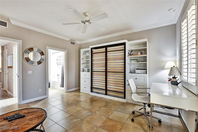 office space featuring visible vents, ornamental molding, baseboards, plenty of natural light, and a ceiling fan