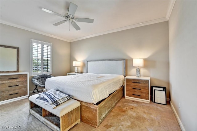 bedroom with crown molding, baseboards, ceiling fan, and light carpet