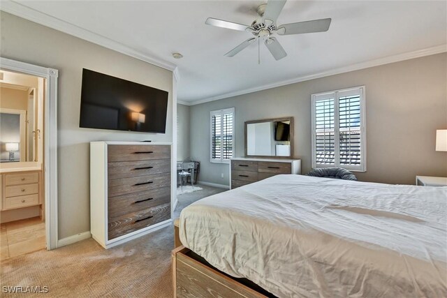 bedroom featuring connected bathroom, ceiling fan, light colored carpet, baseboards, and ornamental molding