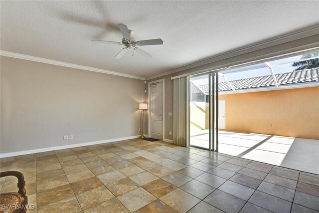 empty room with crown molding, a ceiling fan, and a wealth of natural light