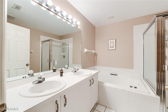 3775 Fieldstone Blvd Unit 104, Naples, FL 34109 - full bath with a garden tub, a sink, a stall shower, and double vanity
