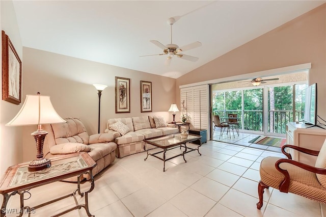 3775 Fieldstone Blvd Unit 104, Naples, FL 34109 - living room featuring a ceiling fan, light tile patterned flooring, and vaulted ceiling