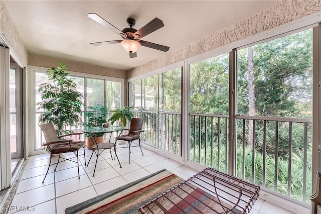 3775 Fieldstone Blvd Unit 104, Naples, FL 34109 - sunroom / solarium featuring tile patterned floors and a ceiling fan