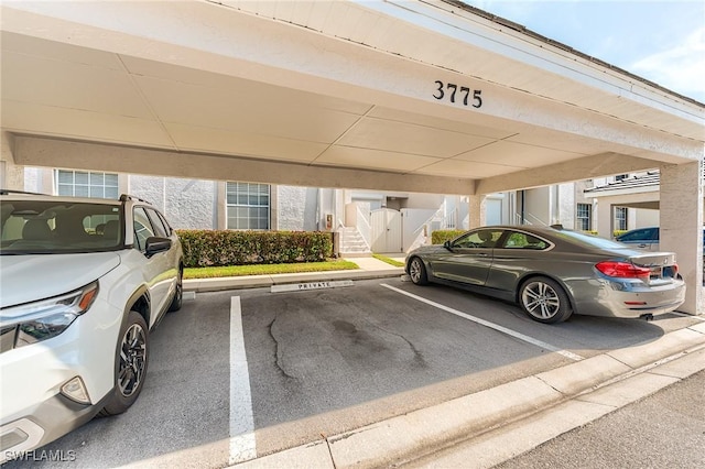 3775 Fieldstone Blvd Unit 104, Naples, FL 34109 - view of covered parking lot