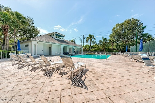 3775 Fieldstone Blvd Unit 104, Naples, FL 34109 - community pool with a patio and fence