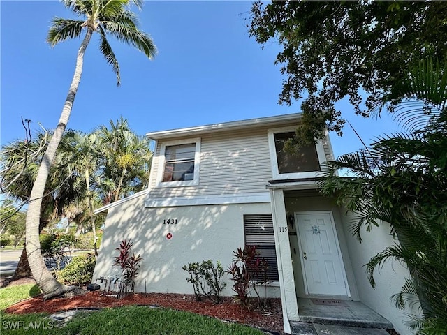 view of front of property featuring stucco siding