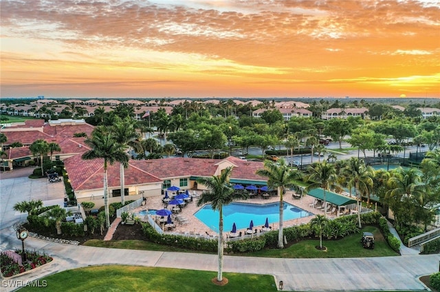 16400 Millstone Cir Unit 206, Fort Myers, FL 33908 - pool at dusk with a community pool