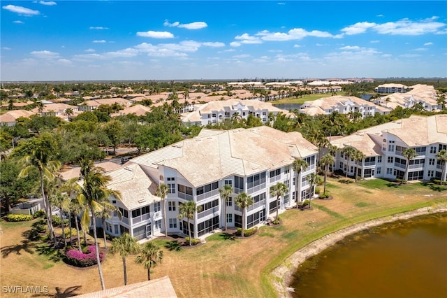 aerial view featuring a water view and a residential view