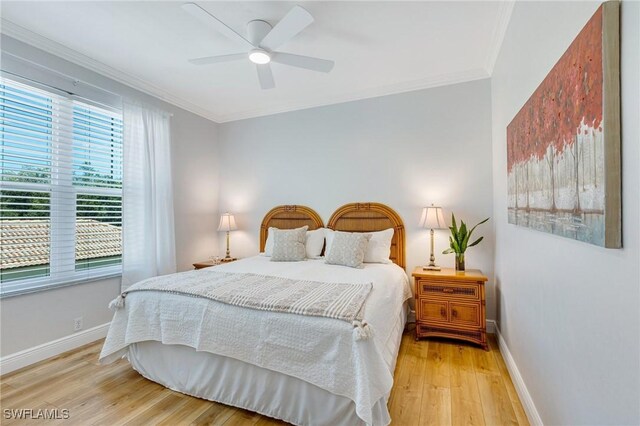 16400 Millstone Cir Unit 206, Fort Myers, FL 33908 - bedroom featuring wood finished floors, ornamental molding, baseboards, and ceiling fan