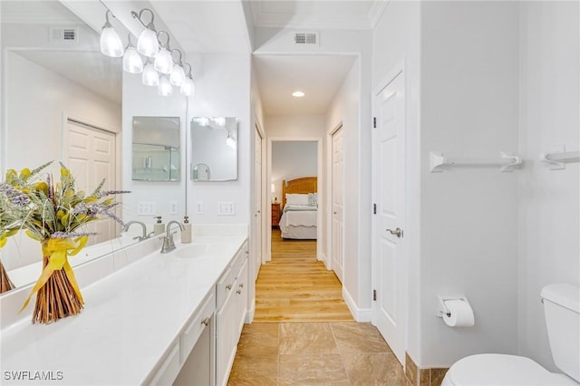 16400 Millstone Cir Unit 206, Fort Myers, FL 33908 - ensuite bathroom with vanity, toilet, baseboards, and recessed lighting