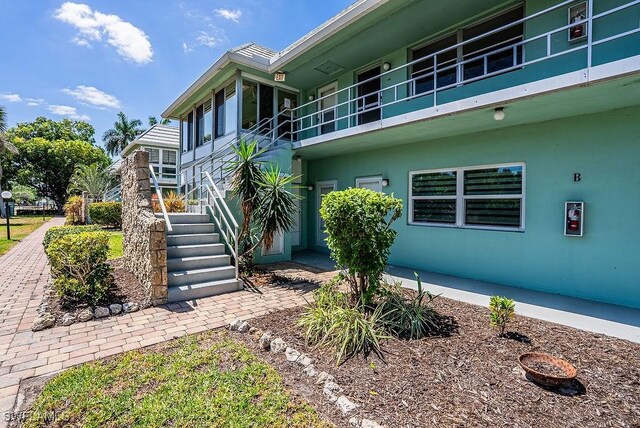 3225 E Riverside Dr Unit 26B, Fort Myers, FL 33916 - view of community featuring stairs