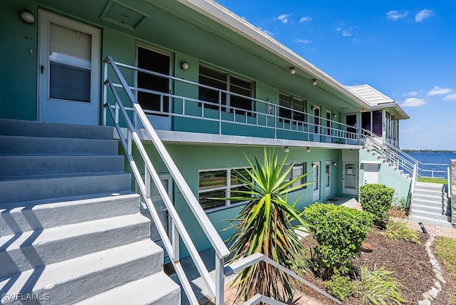 3225 E Riverside Dr Unit 26B, Fort Myers, FL 33916 - doorway to property with stucco siding